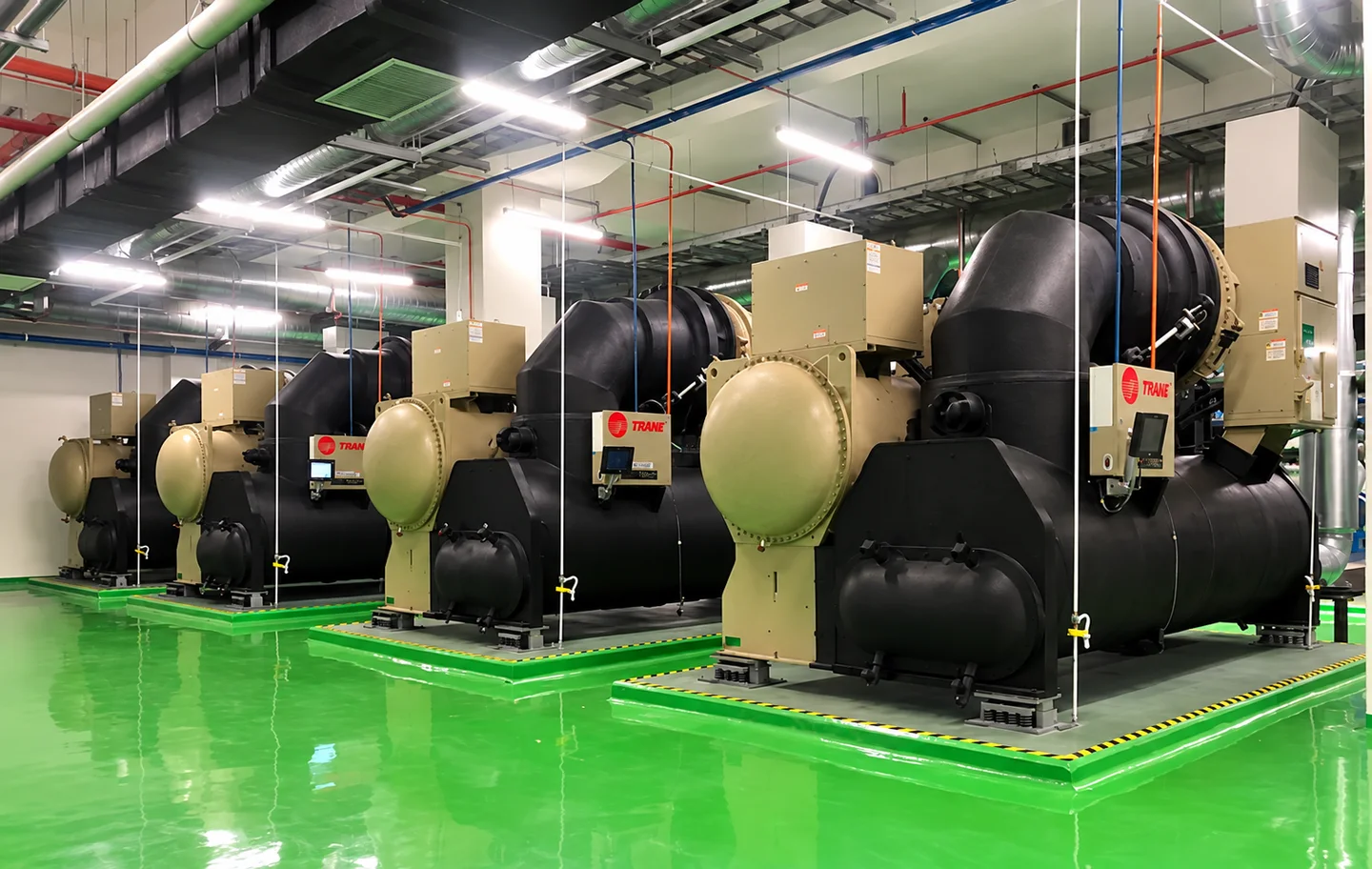 Industrial chiller equipment in a plant room