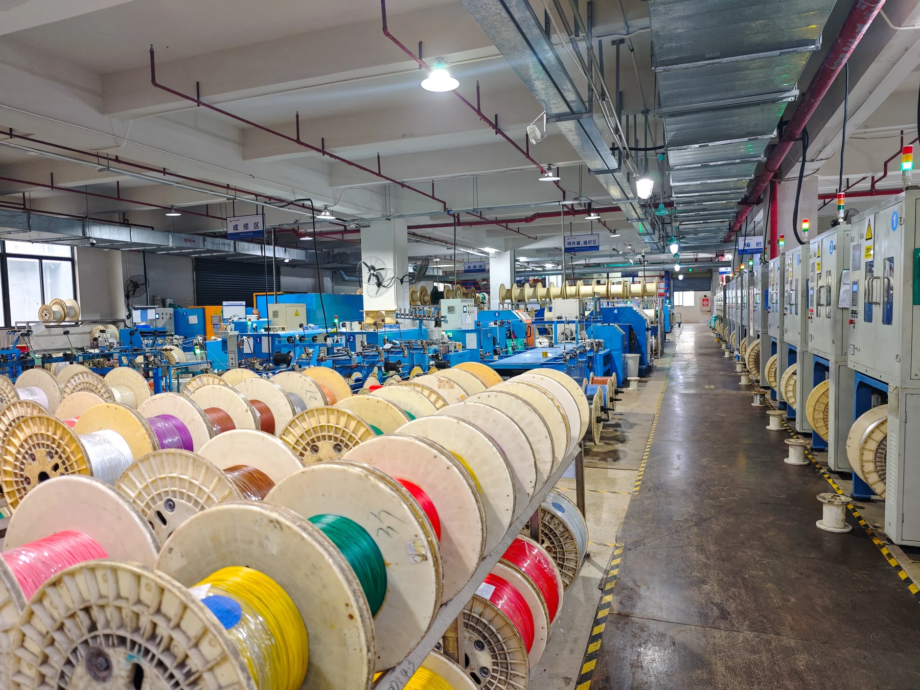 Reels on the workshop floor at ANYANG cable manufacturing base
