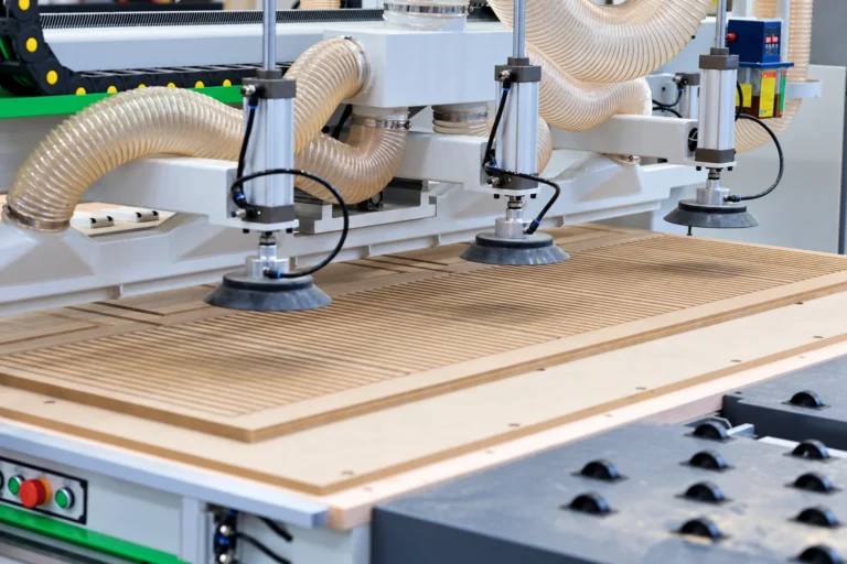 CNC woodworking machine heads and extraction hoses