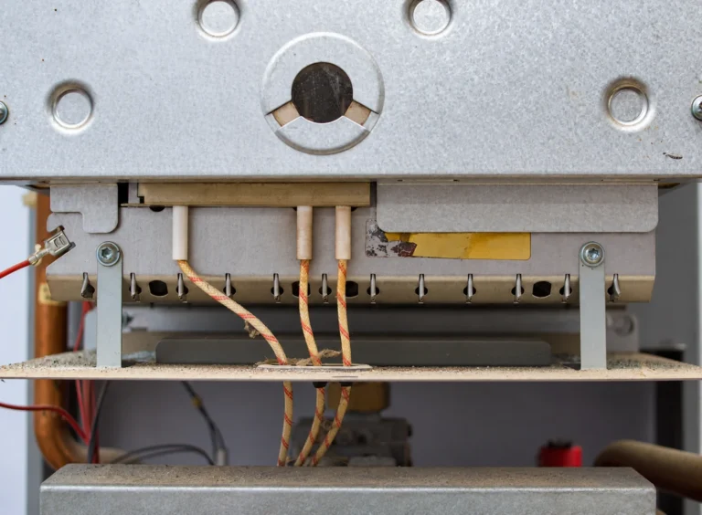 Electrical leads connected to a heating element