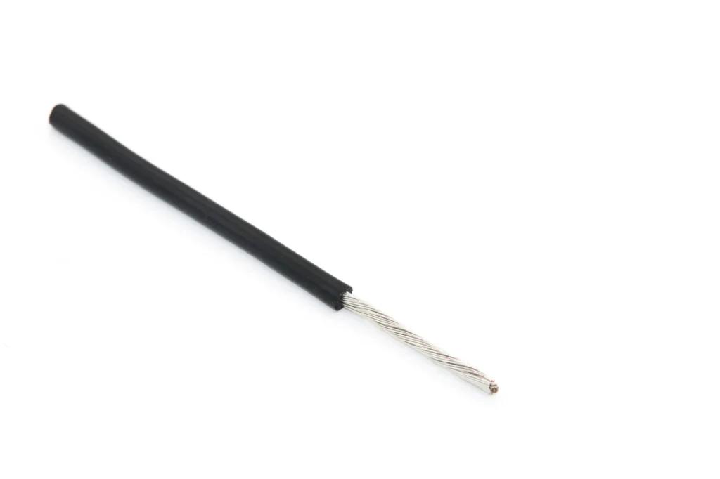 Straight black silicone wire sample with a long stripped conductor.