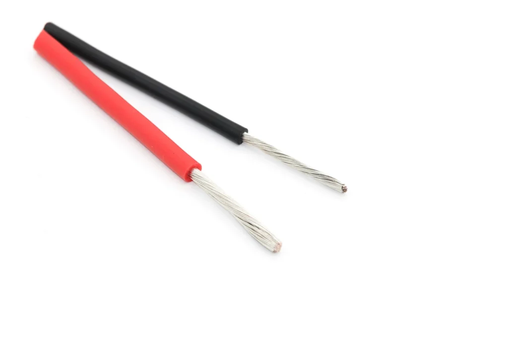 Red and black straight silicone wire samples with exposed metal strands.