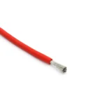 Red silicone wire sample with a short stripped conductor end.