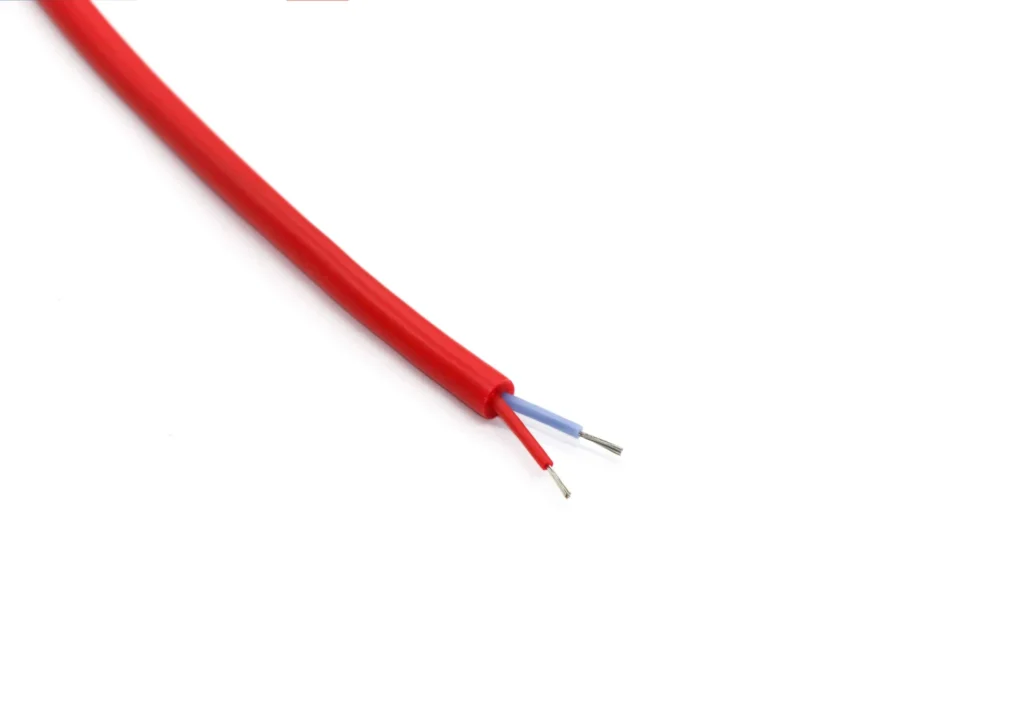 Red sheathed two-core silicone cable sample with blue and red insulated cores.